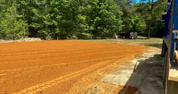 Graded substrate in preparation of pad for construction project
