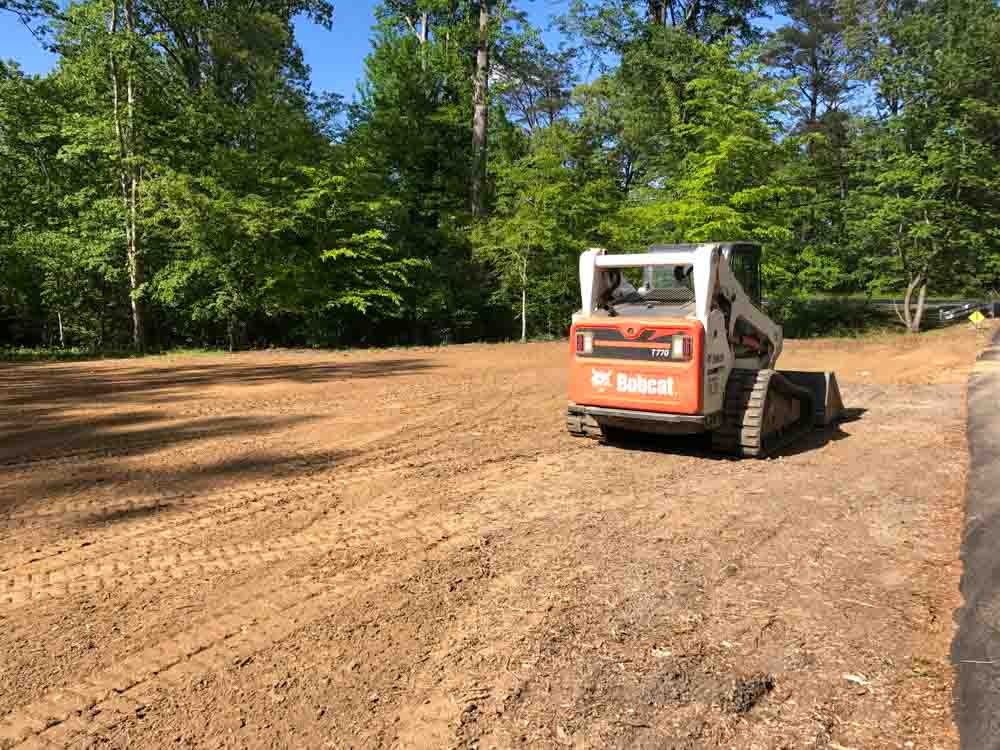 Grading the surface in preparation for a construction project